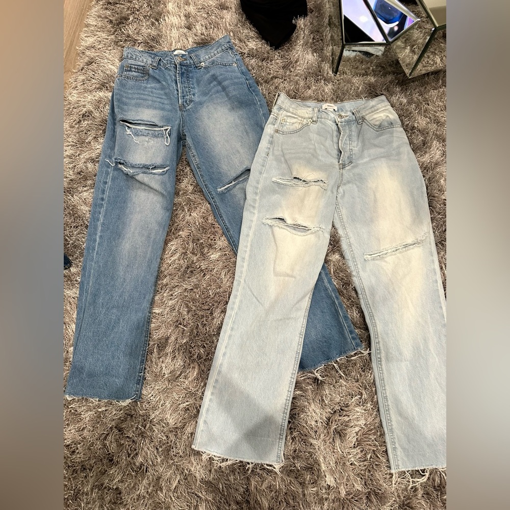 Two pairs of Forever 21 Dark and Light wash jeans